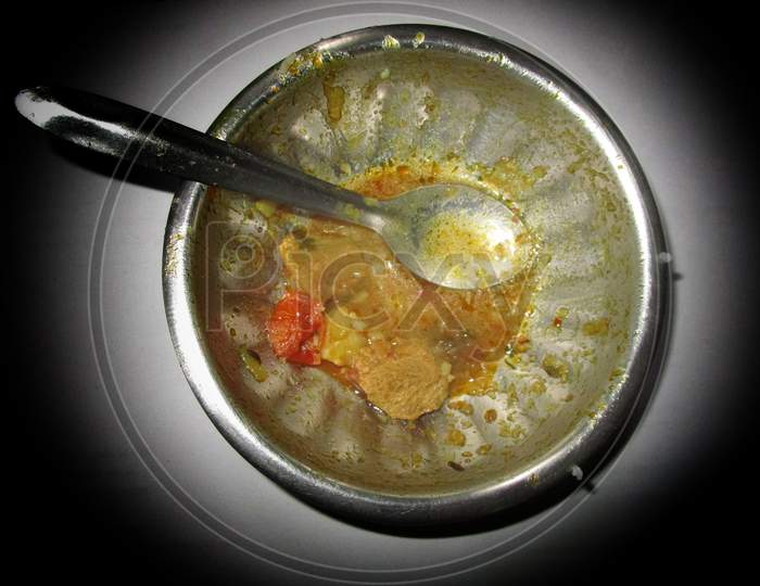 Empty bowl with left gravy , soyabean dish