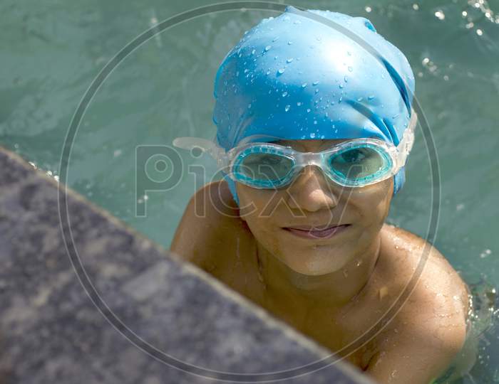 Portrait of a Kid in Swimming Pool