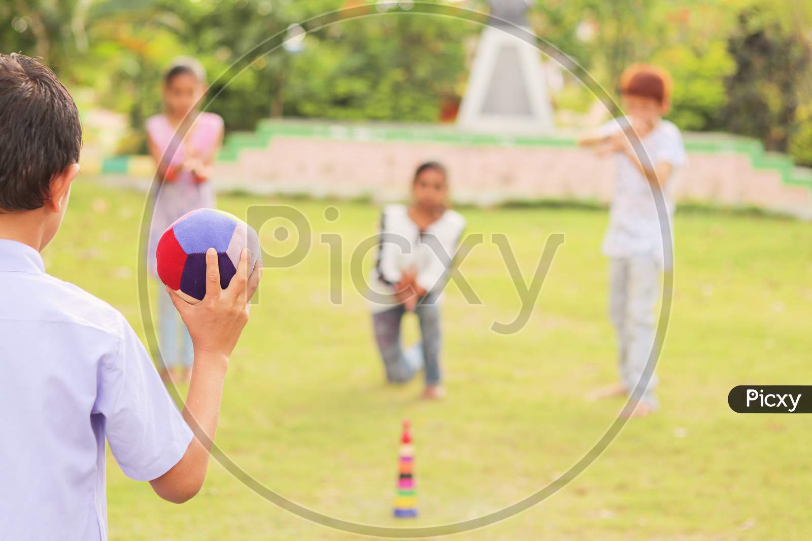 Children's Playing Games At Park, Outdoor - Kids Playing Traditional Games Outside During Leisure.