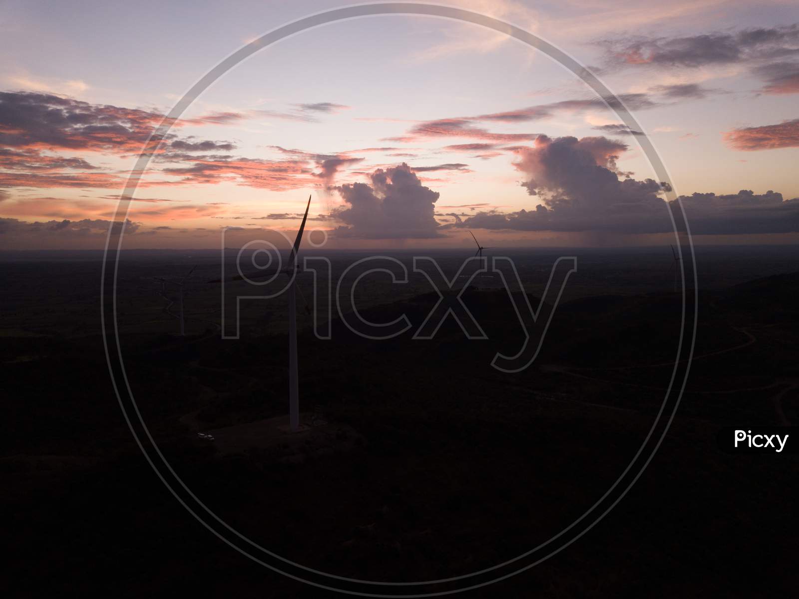 Drone shot of Windmills during sunset