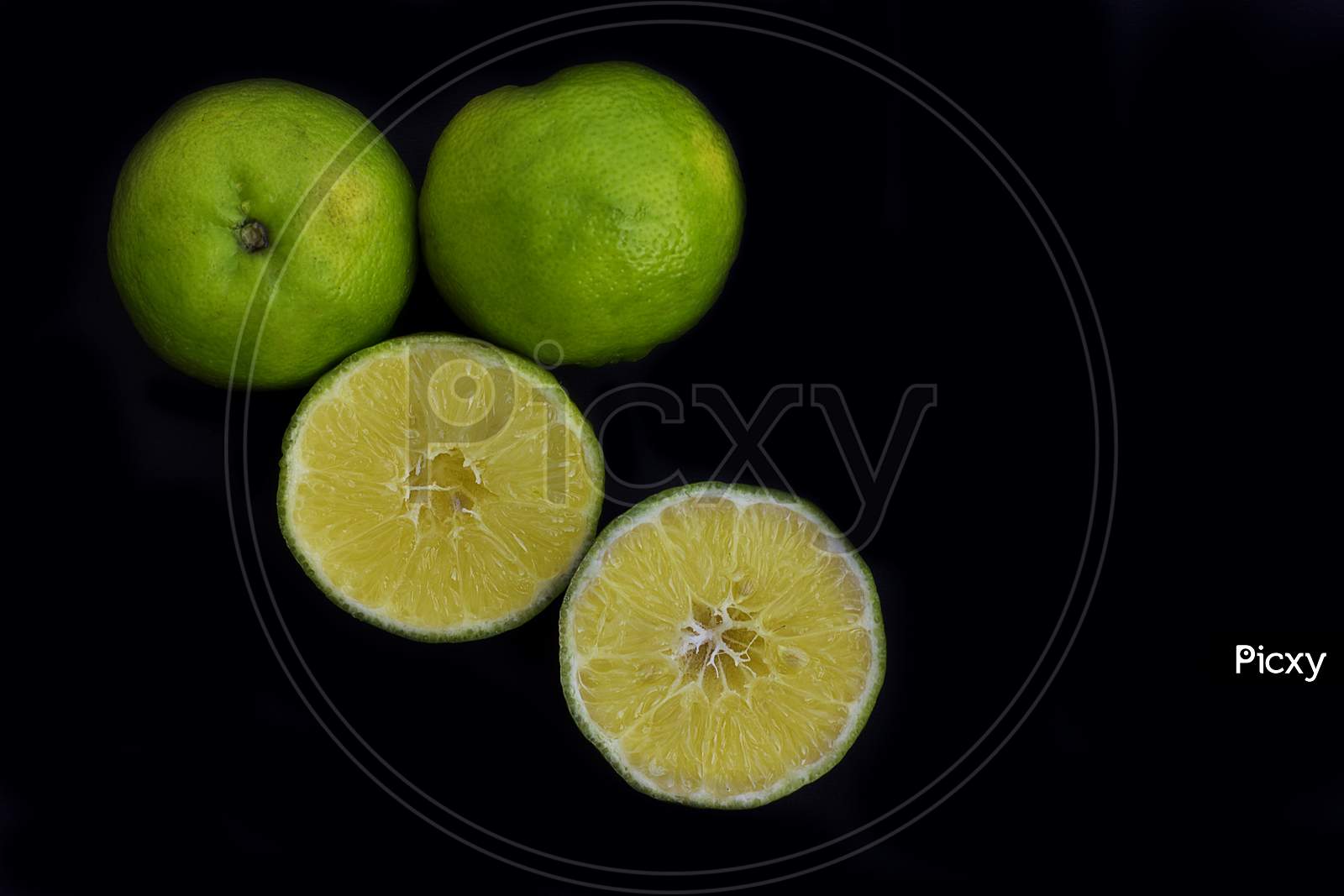 Lemon pieces on white background