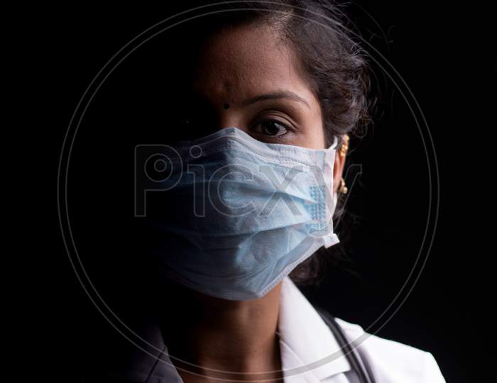 Close up shot of a Doctors Face with Mask