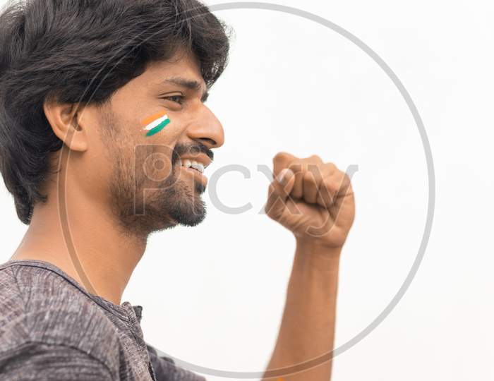 Portrait Of Young Cheerful Indian Male Cricket Fan On Isolated Background