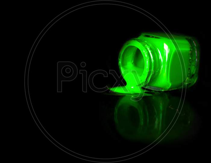 Selective Focus on Green Colour Paint with Black Background