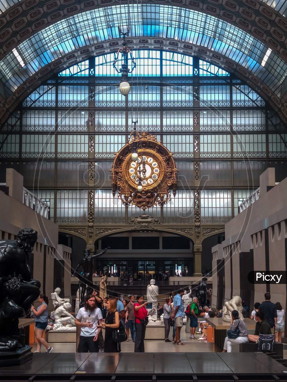 Paris, France- July 2018: Old Station Orsay Museum Golden Retro Clock