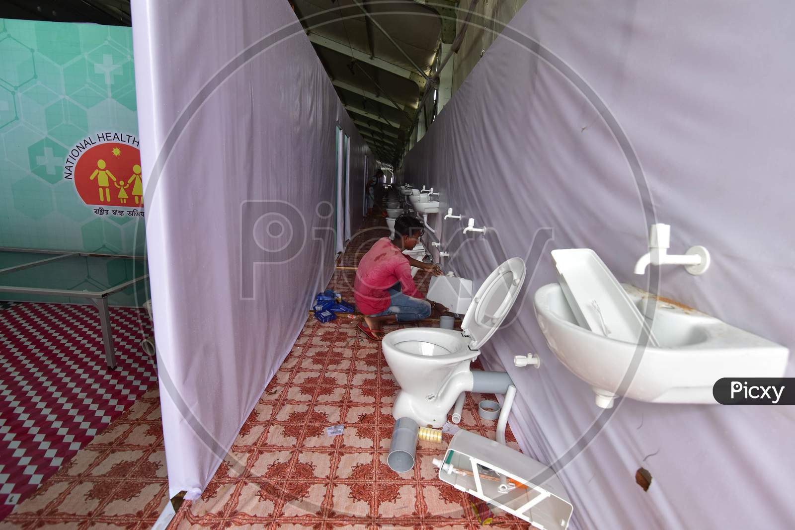 Indian Workers Prepare The Newly-Established Quarantine Center For The Covid-19 Patients During Nationwide Lockdown At Veterinary College Field Khanapara, In Guwahati, Assam, India, 11 June 2020.
