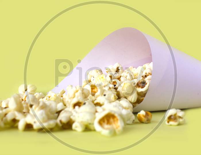 Pop Corns with yellow Background