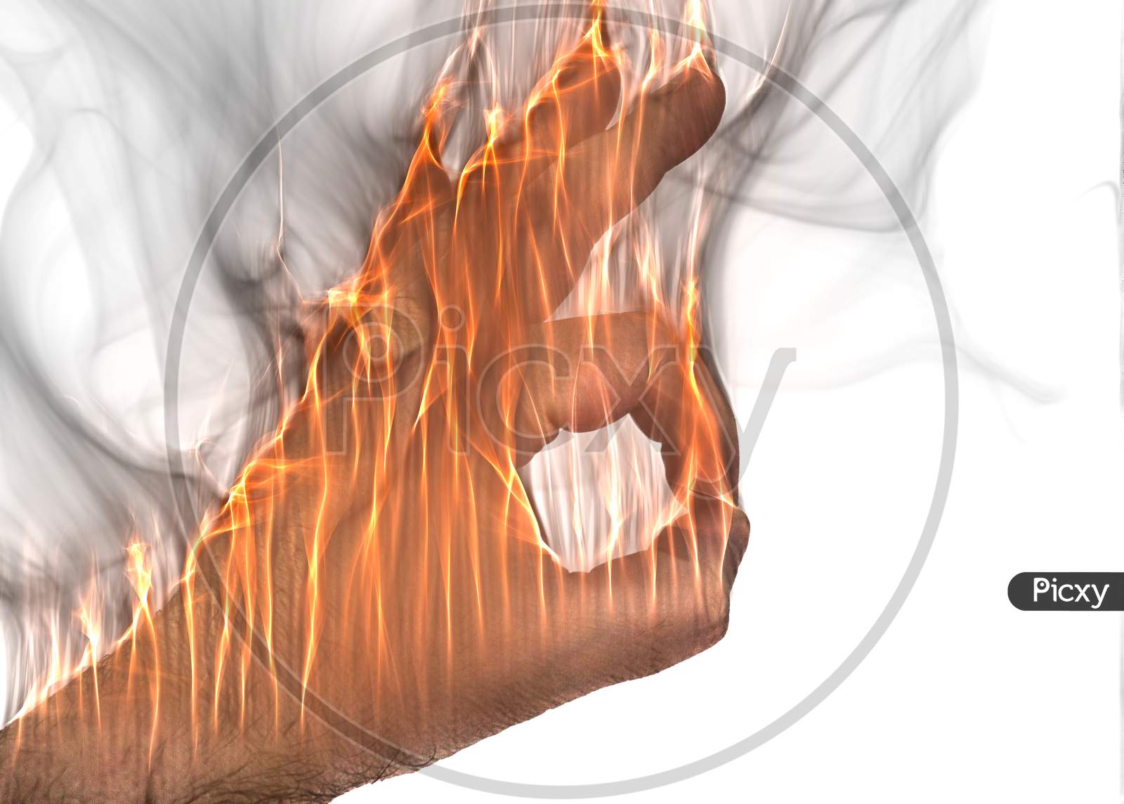 A Human Hand On Fire Burning With Orange Flames And Some Smoke In Front Of A Bright Background