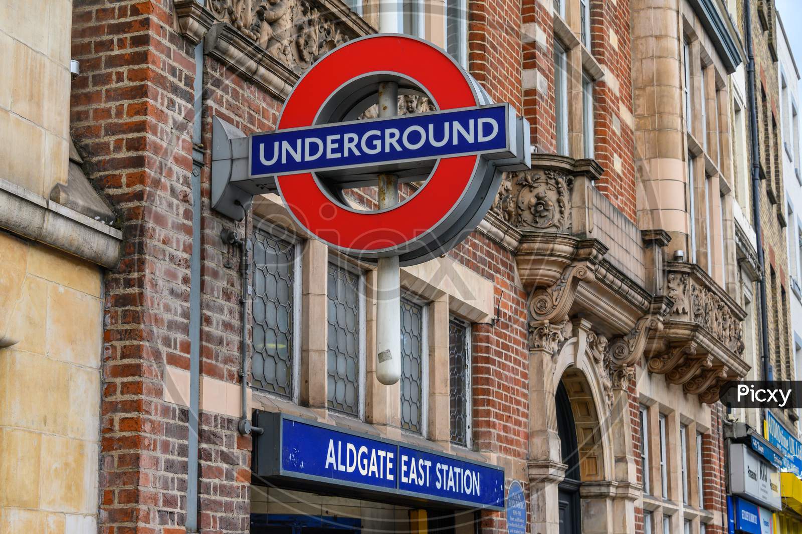 London Underground Tube Station Sign Above The Entrance To Aldgate East Tube Station