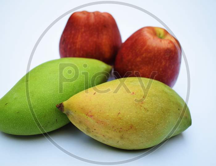 Totapuri Mango Or Bangalora Mango With Fresh Red Apples