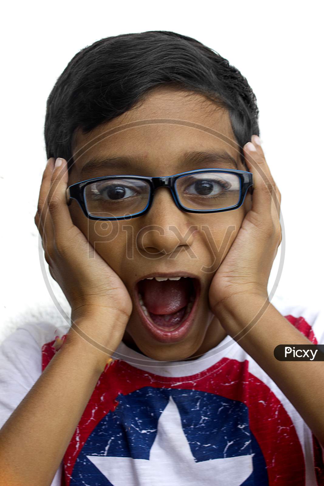 Portrait of a Young Indian Boy with Shouting Expression