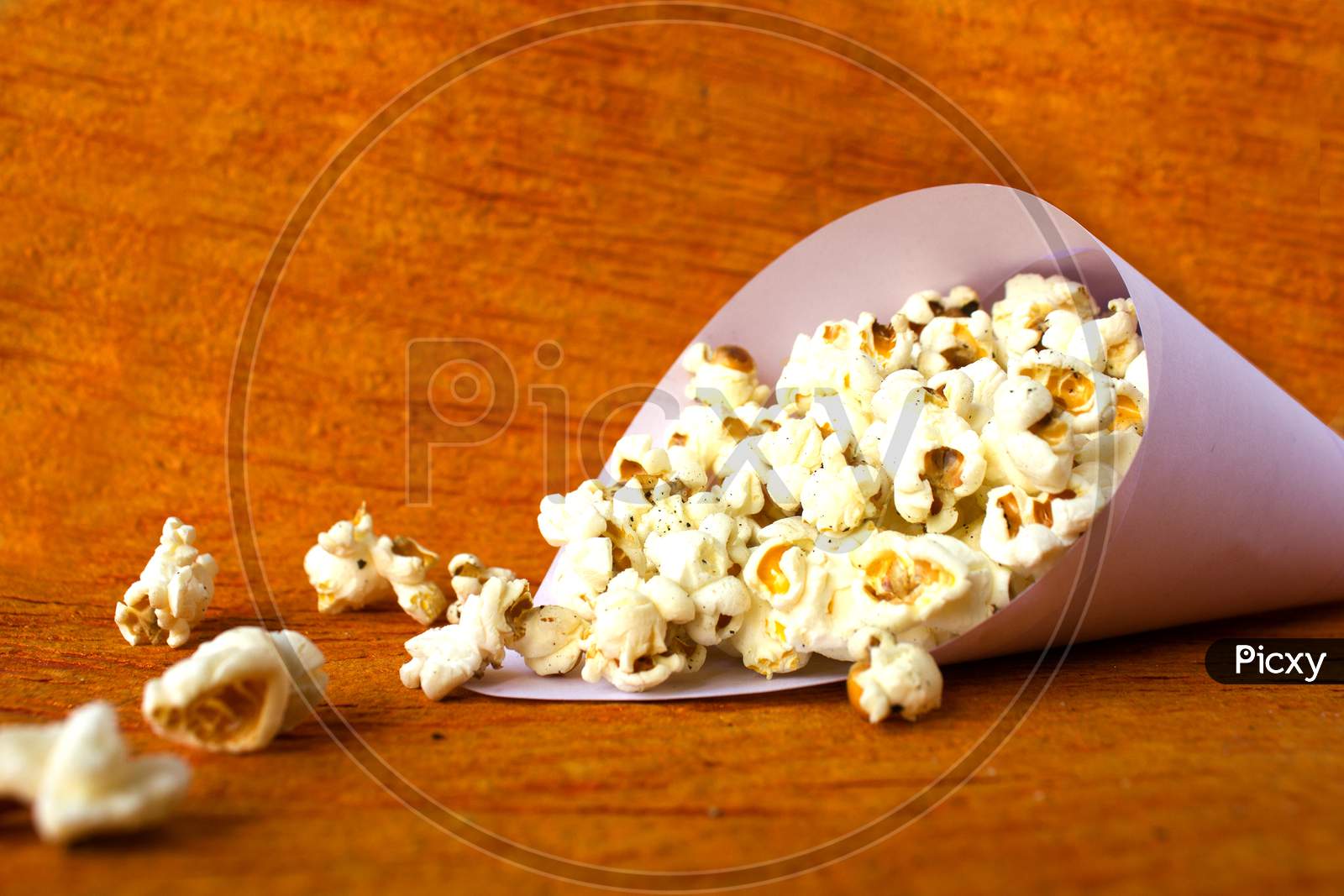 Pop Corns with Brown Background
