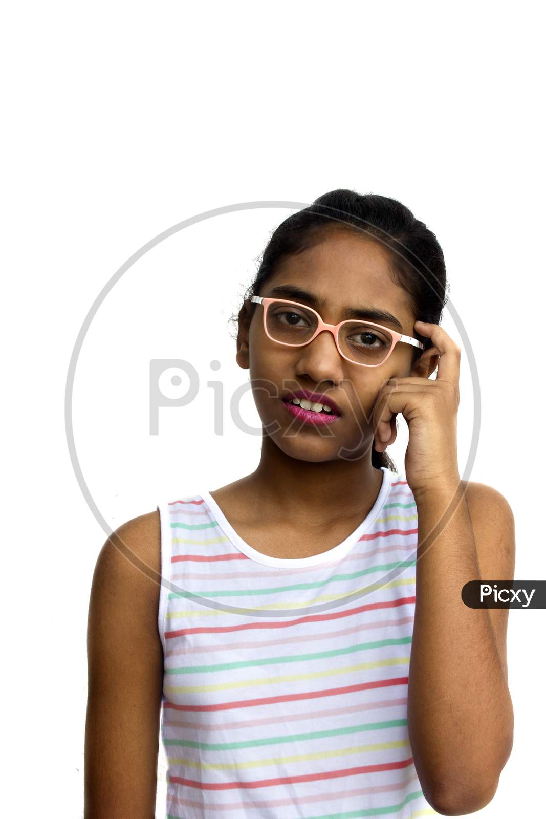 Portrait of a Young Indian Girl with Thinking Expression
