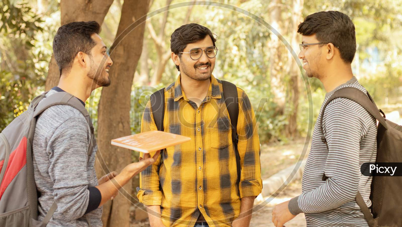 College Friends Socializing - Students Talking With Each Other At University Campus - Concept Of Happy College Days And Student Life.