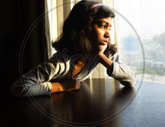 Portrait of a Young Indian Girl with Sad Face