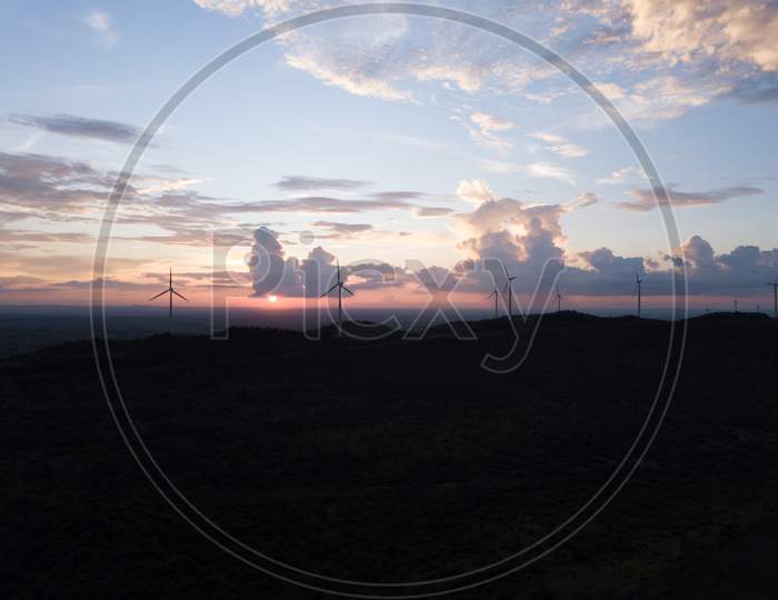 Drone shot of Windmills during sunset