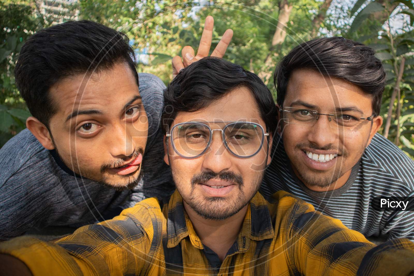 Group Of Happy Young College Students Taking a Selfie At University Campus