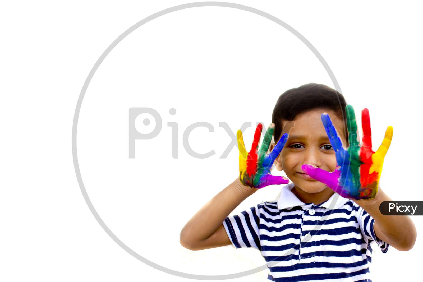Portrait of a Kid with paint on the palm