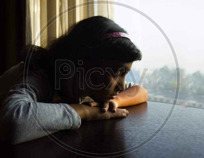 Portrait of a Young Indian Girl with Sad face