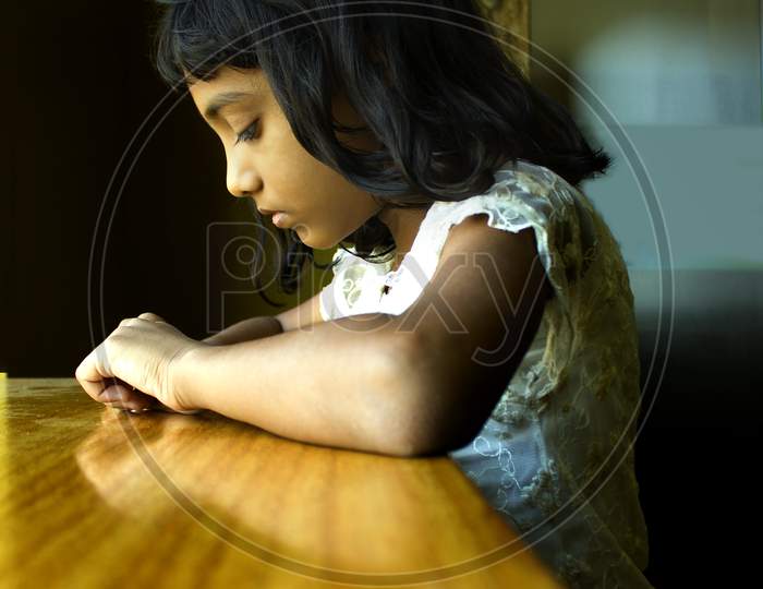 Portrait of a Young Indian Girl with Sad face