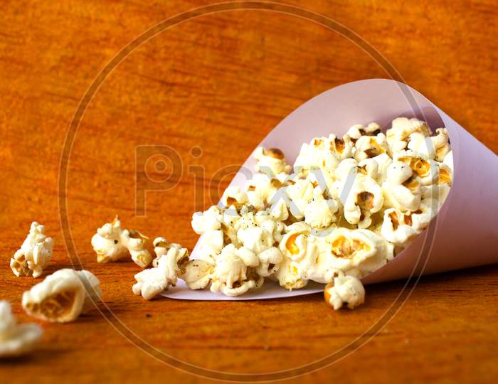 Pop Corns with Brown Background