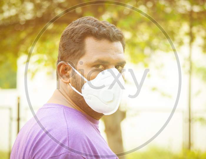 Young Man Properly Covered Nose And Mouth With Face Mask - Awareness And Safety Concept To Ware Mask Properly, To Protect From Coronavirus Or Covid-19