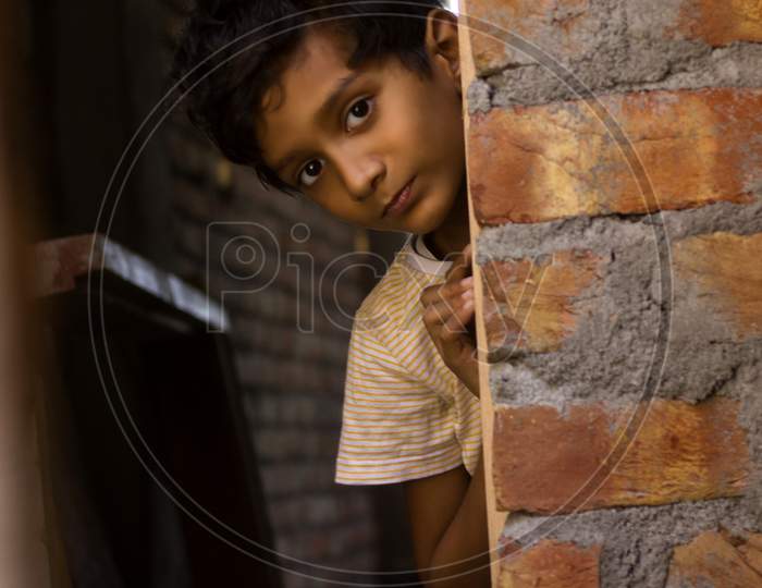 Portrait of Kid through a Wall