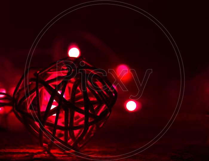 Selective Focus on String Balls with Bokeh Background