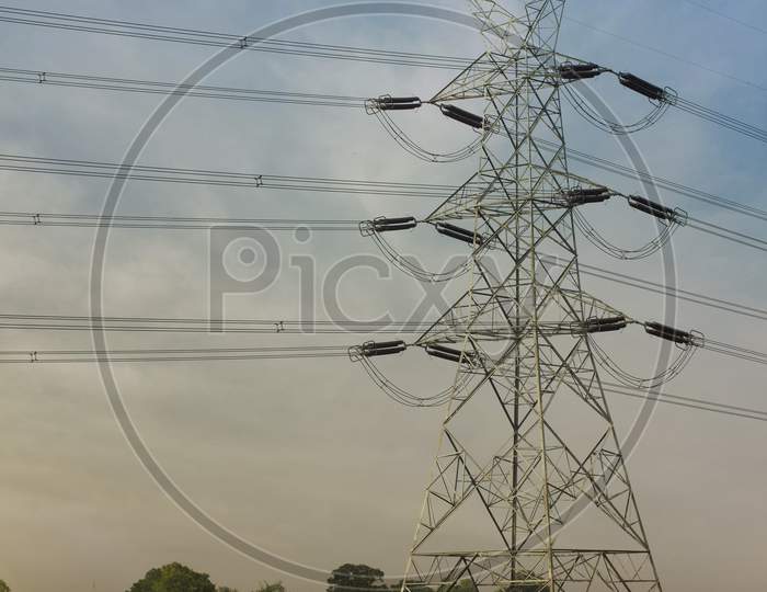 An Electric Tower in Agricultural Fields
