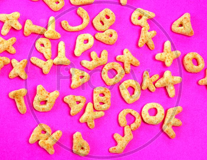 Alphabetical Fryums on a Pink Background