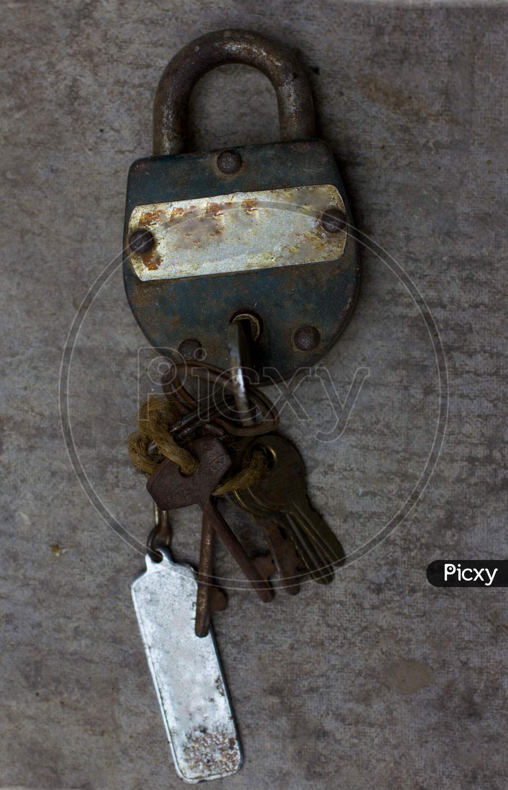 A Rusted Clock with Keys