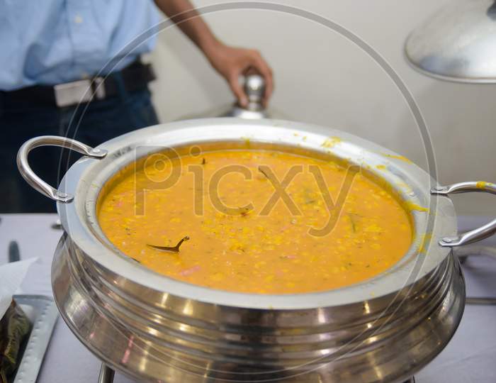 Dal served at a indian wedding