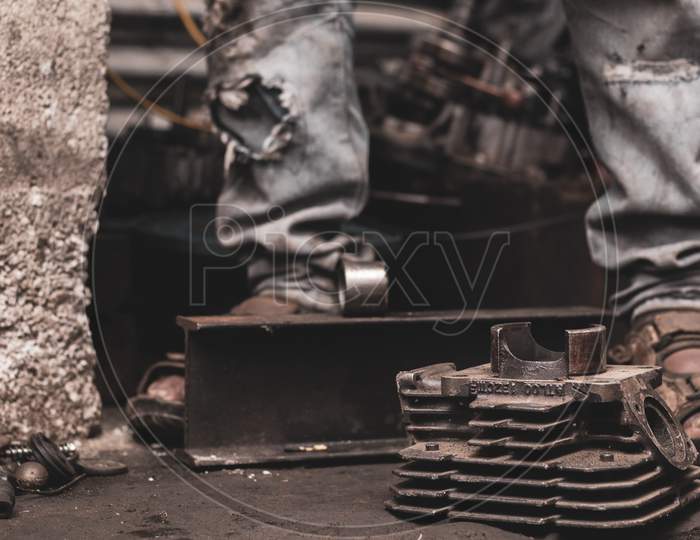 Selective Focus on an Engine with a Person in Background