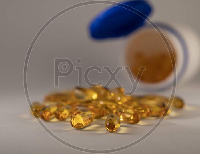 Pile of capsules Omega 3