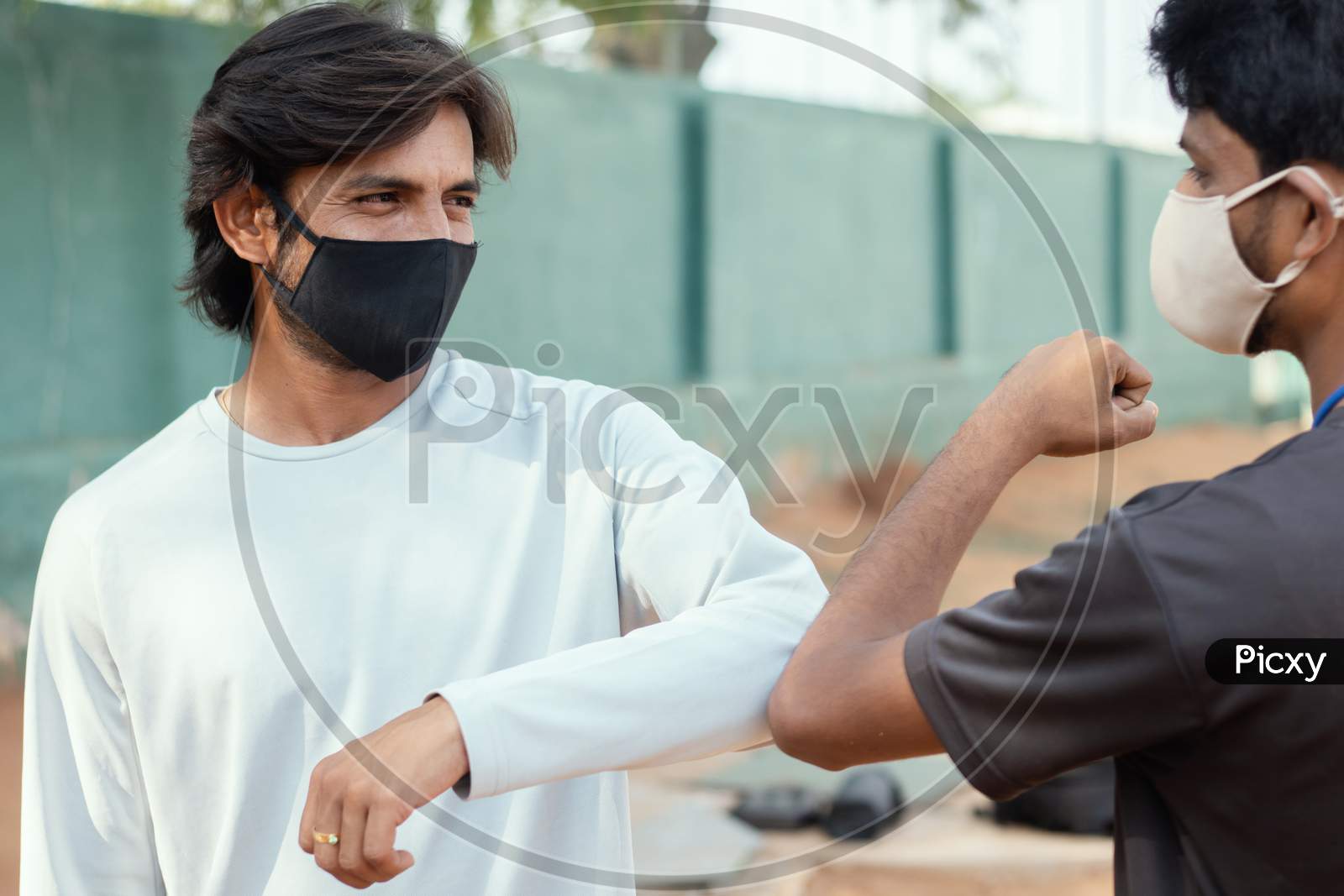 Young Indian man with a Black mask on face