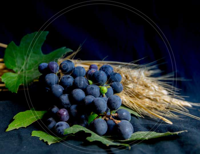 Wheat Grapes Bread And Crown Of Thorns On Black Background As A Symbol Of Christianity