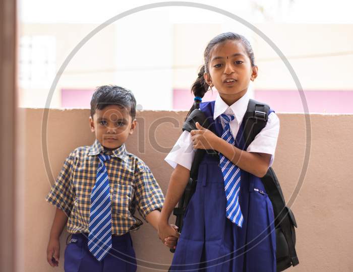 Portrait of a School Kids in School Dress with School Bag