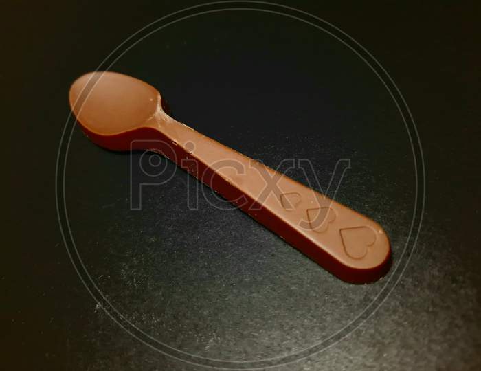 Chocolate Spoon Bar On Grey Black Background Stock Image Photos