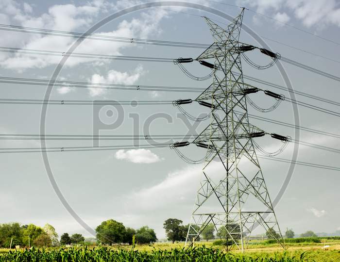 An Electric Tower in Agricultural Fields