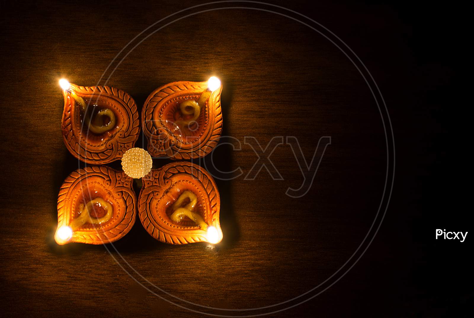 A Lightened Diya's A Concept of Happy Diwali Greetings