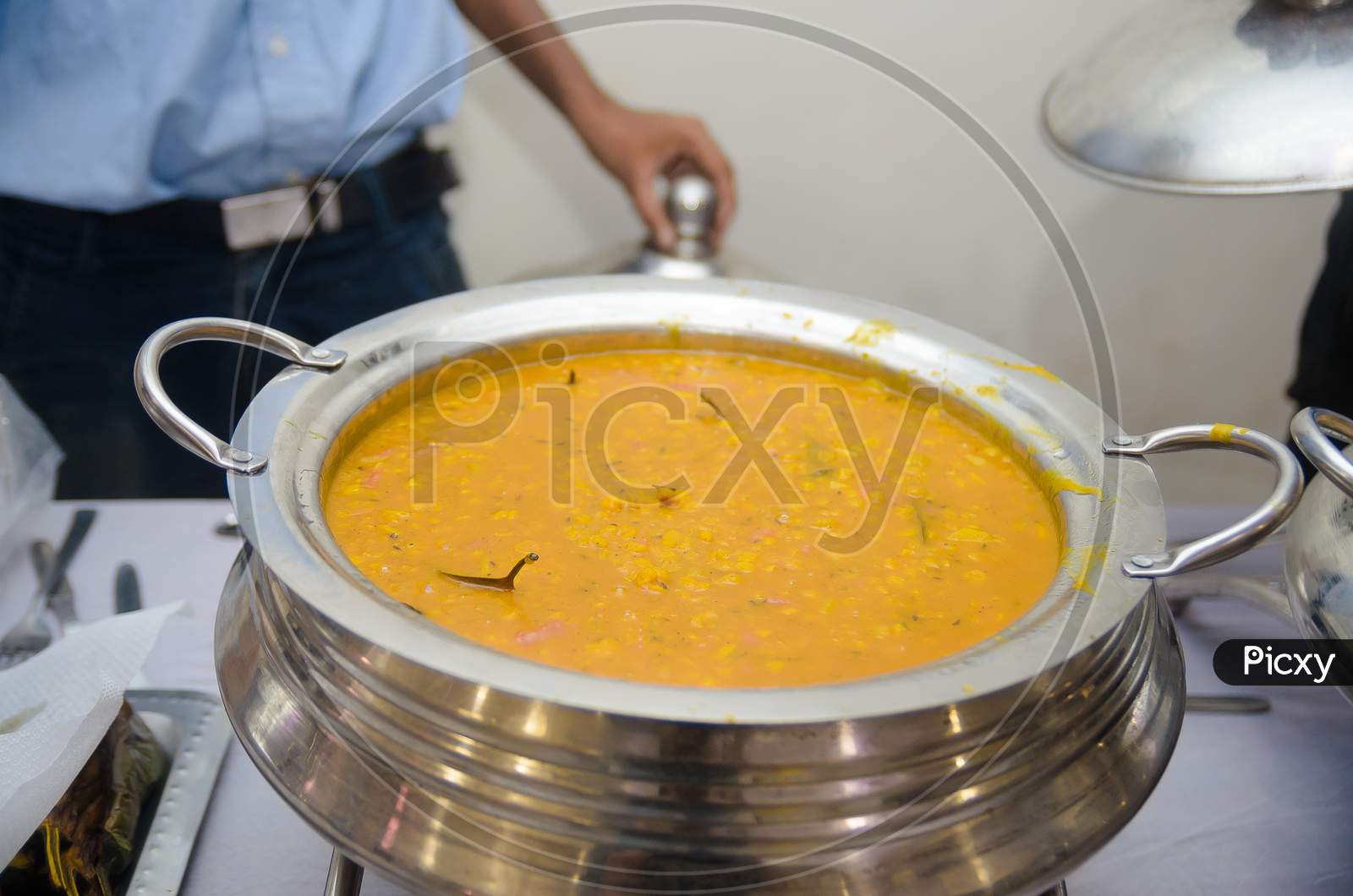 Dal served at a indian wedding