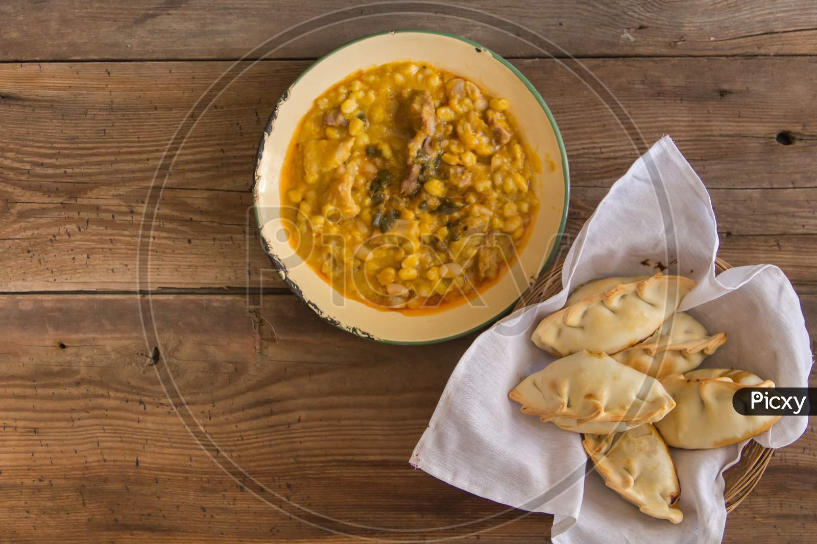 Locro Dishes And Empanadas, Traditional Argentine Foods That Are Frequently Consumed For National Holidays, Such As The Revolution Of May 25 And Independence On July 9