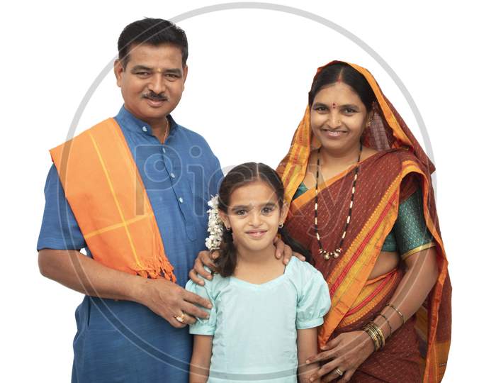 A Happy Three membered Indian family isolated with White Background