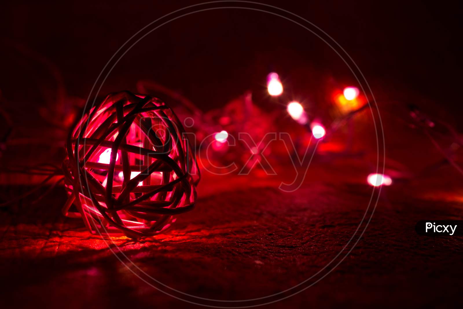 Selective Focus on String Balls with Bokeh Background
