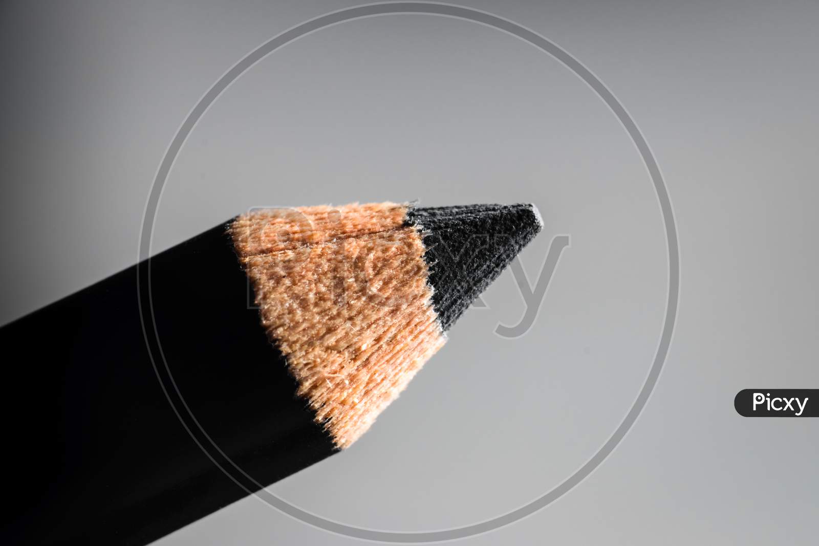 A Macro Shot Of A Black Pencil Tip. Kept In A White Background