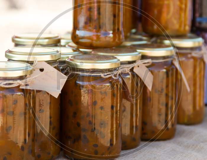 Jars With Passion Fruit Jams At The Street Fair