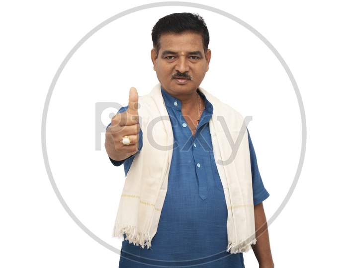 A Happy Indian Man in Traditional Dress Showing Thumbs Up isolated with White Background