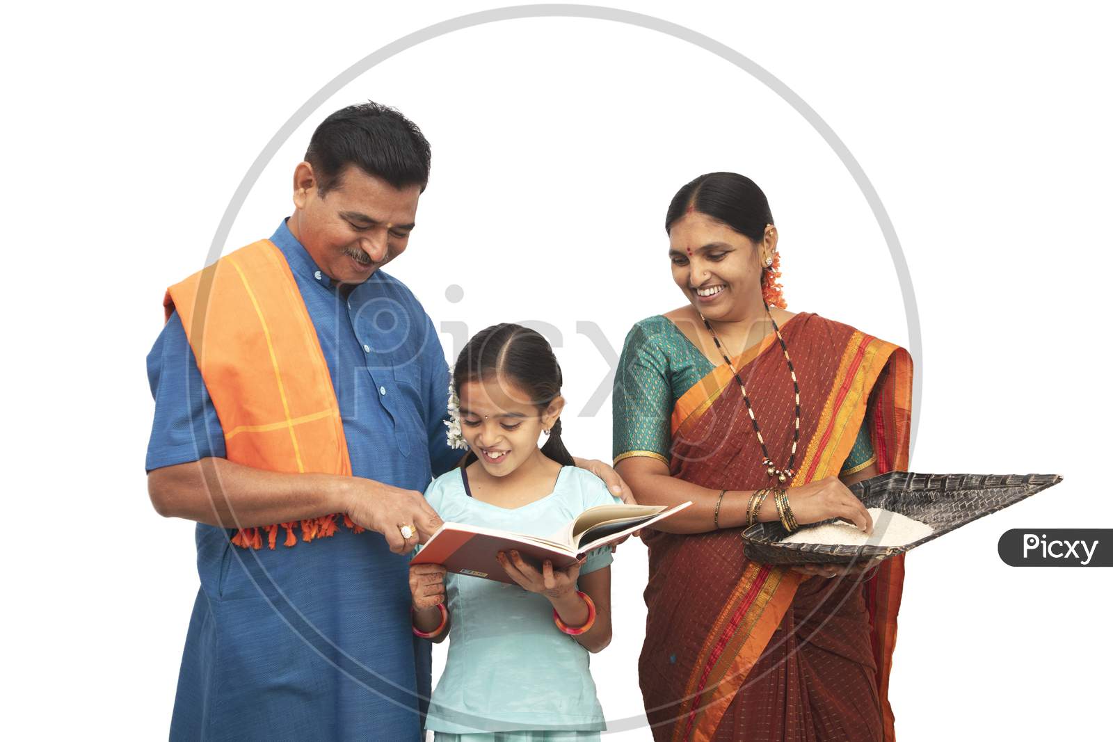 A Happy Three Membered Family Helping Child to Study