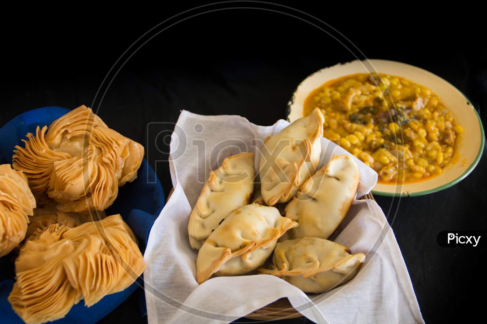 Dishes Of Locro Empanadas And Sweet Pastries, Traditional Argentine Foods That Are Frequently Consumed For National Holidays, Such As The Revolution Of May 25 And Independence On July 9