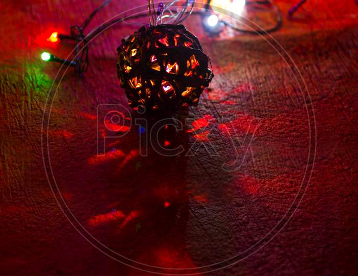 Selective Focus on String Ball with Bokeh Background